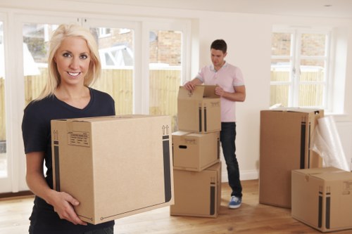 Professional packing team preparing household items in Arnosgrove